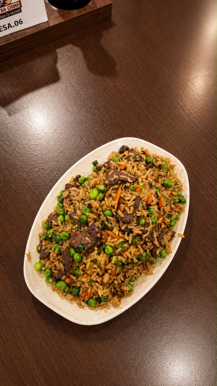 Arroz Chop-Suey ( Arroz com Carne, cebola , ervilha , cenoura em pedacinhos e shoyu)
